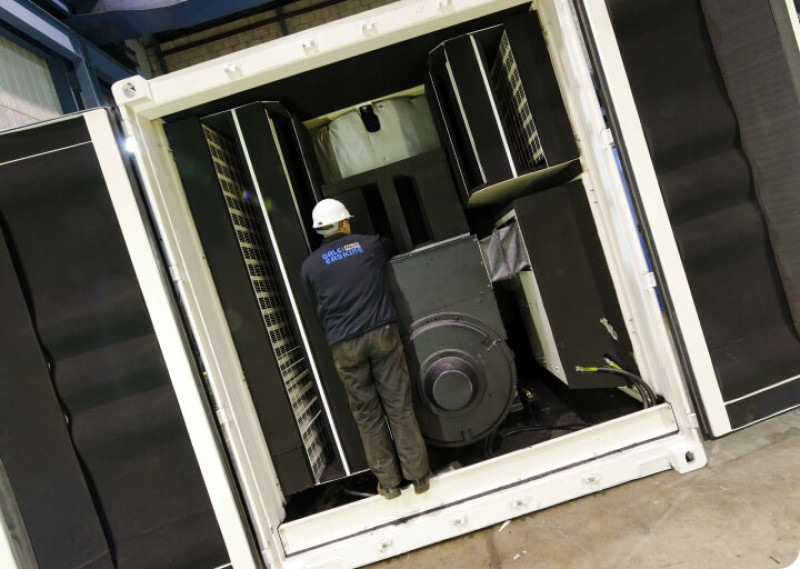 Containerised generator with workman